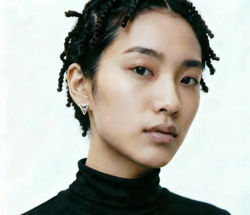 Evil Eye Stud Earrings worn by female model